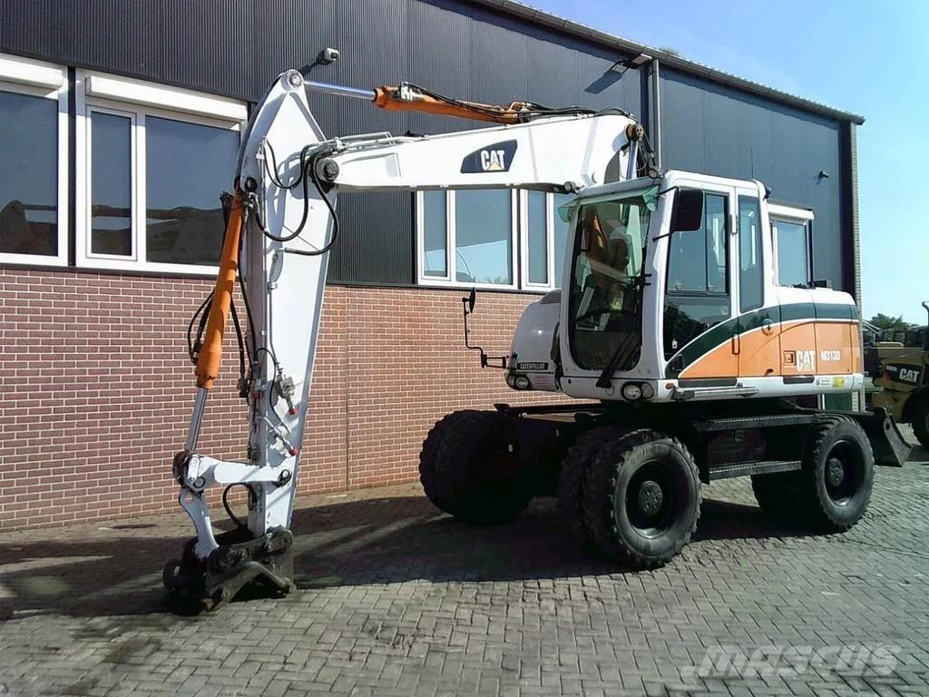 CAT M313D Hjulgravere