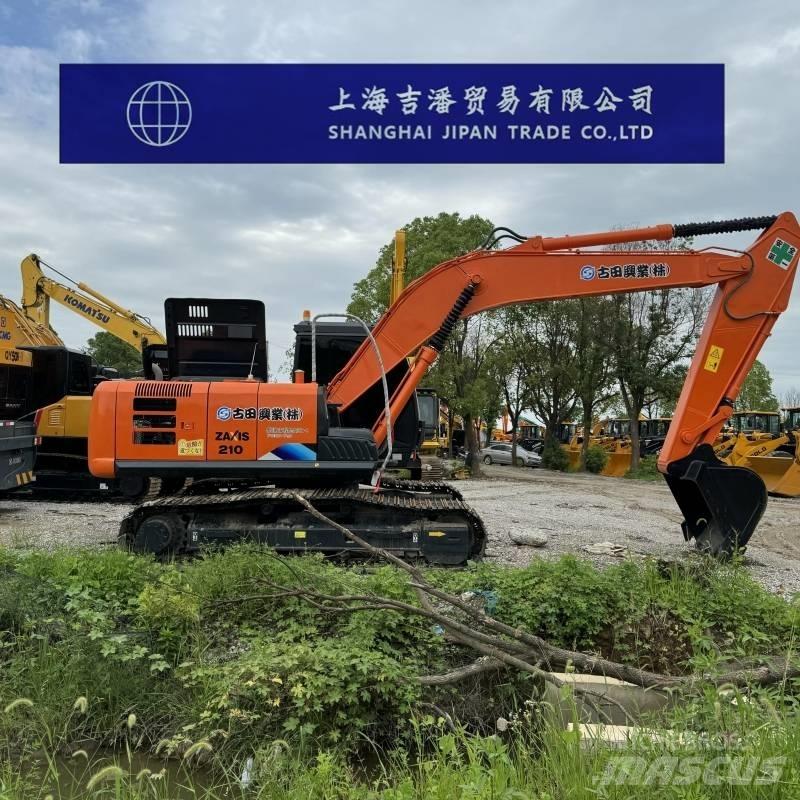 Hitachi ZX 210 Beltegraver