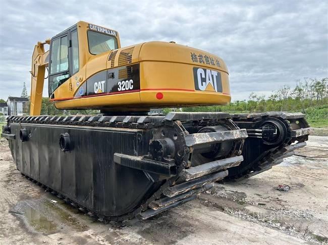 CAT 320 C Amfibiske Gravemaskiner