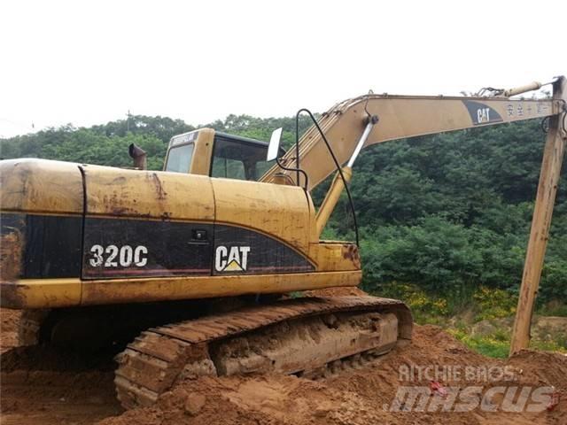 CAT 320 C Gravemaskiner med lang bom