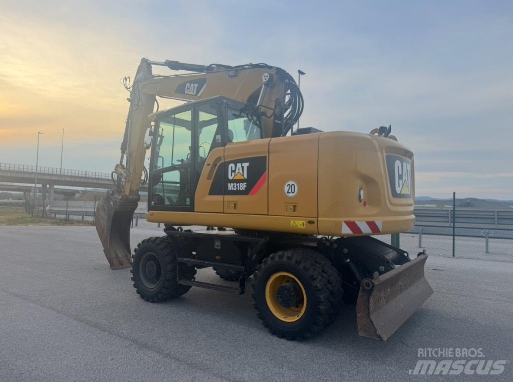 CAT M 318 F Hjulgravere