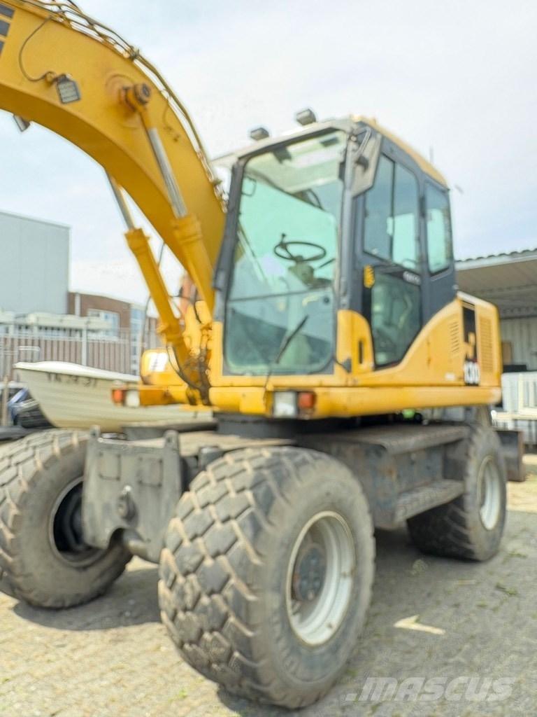 Komatsu PW 130-7K Hjulgravere