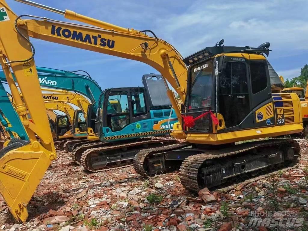 Komatsu PC130-7 Beltegraver