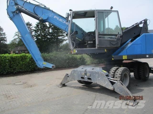 Fuchs MHL 320 Gravemaskiner for avfallshåndtering