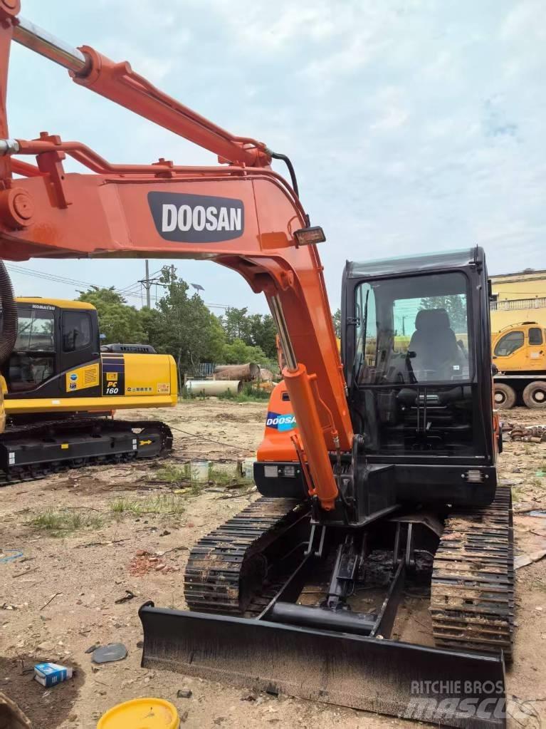 Doosan DX 60 Beltegraver