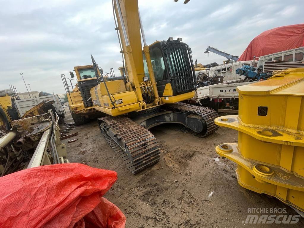 Komatsu PC210-10MO Beltegraver