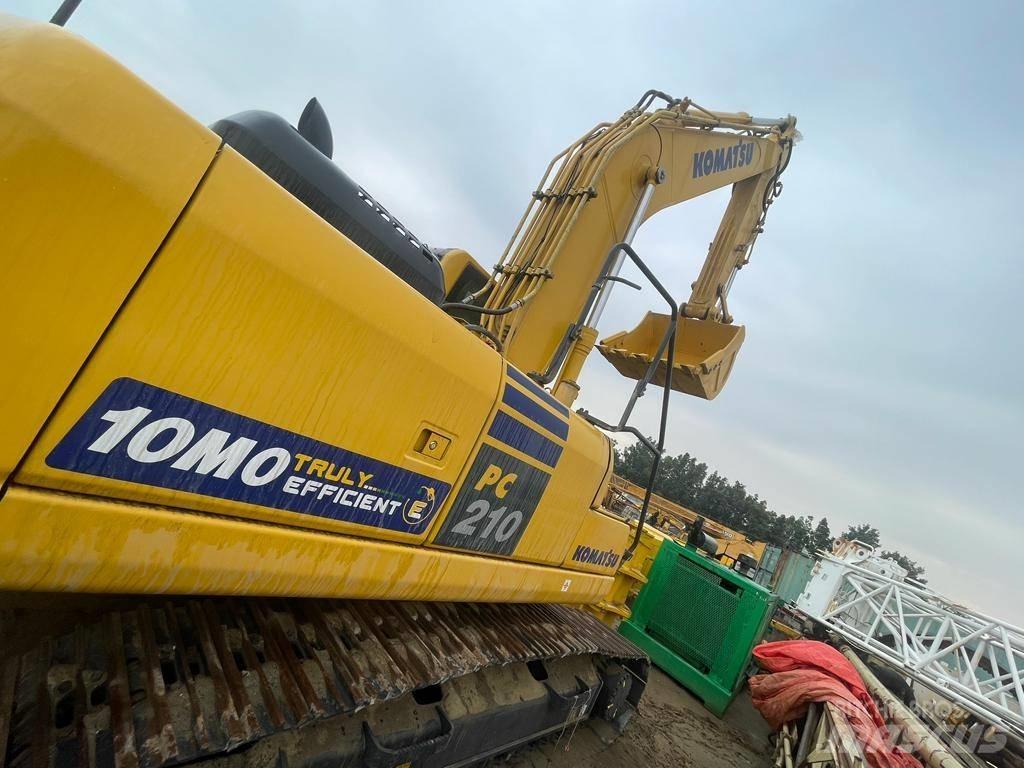 Komatsu PC210-10MO Beltegraver