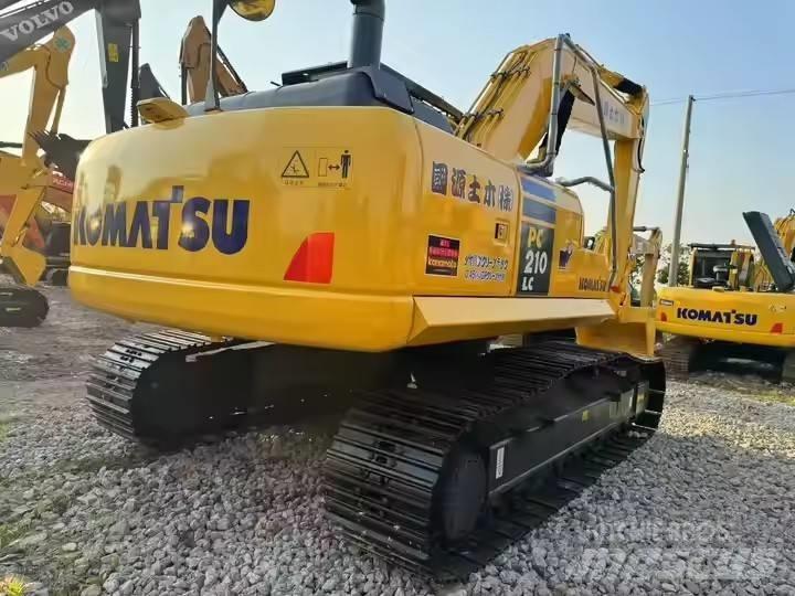 Komatsu PC210LC Beltegraver