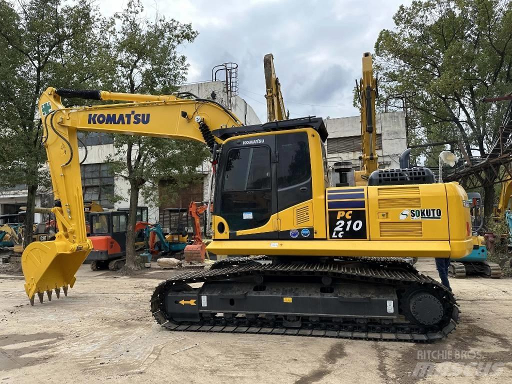 Komatsu PC 210-8 Beltegraver