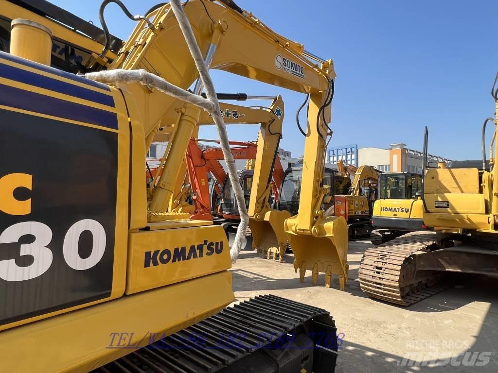 Komatsu PC130-7 Beltegraver