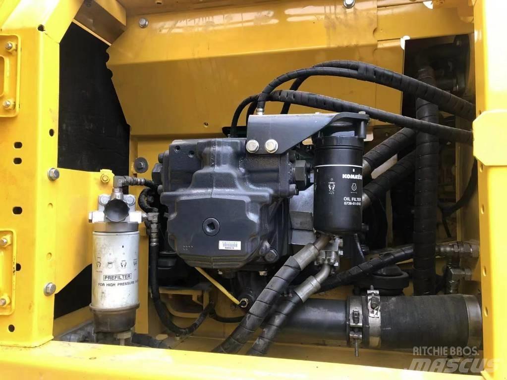 Komatsu PC 210 LC Beltegraver