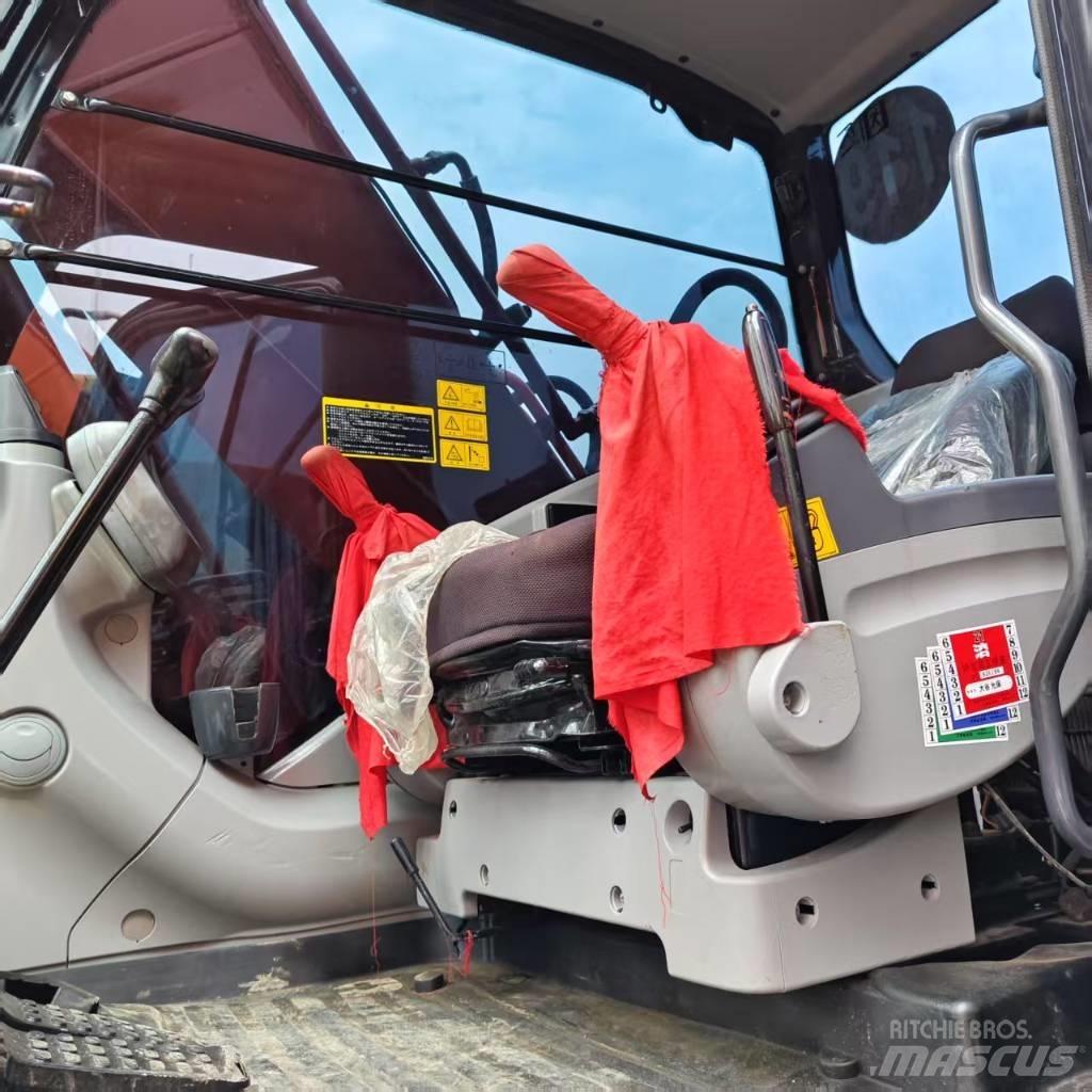Hitachi ZX 210 Beltegraver