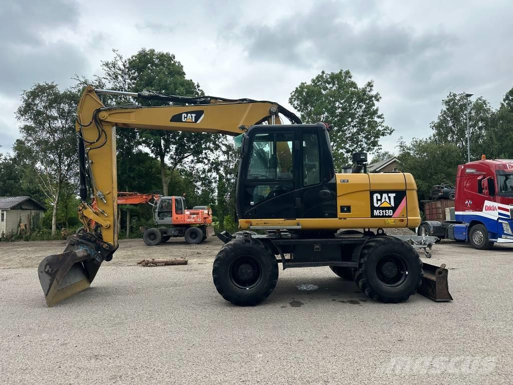 CAT M 313 D Hjulgravere