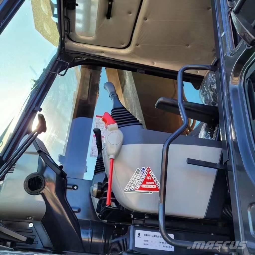 Komatsu PC 450 Beltegraver