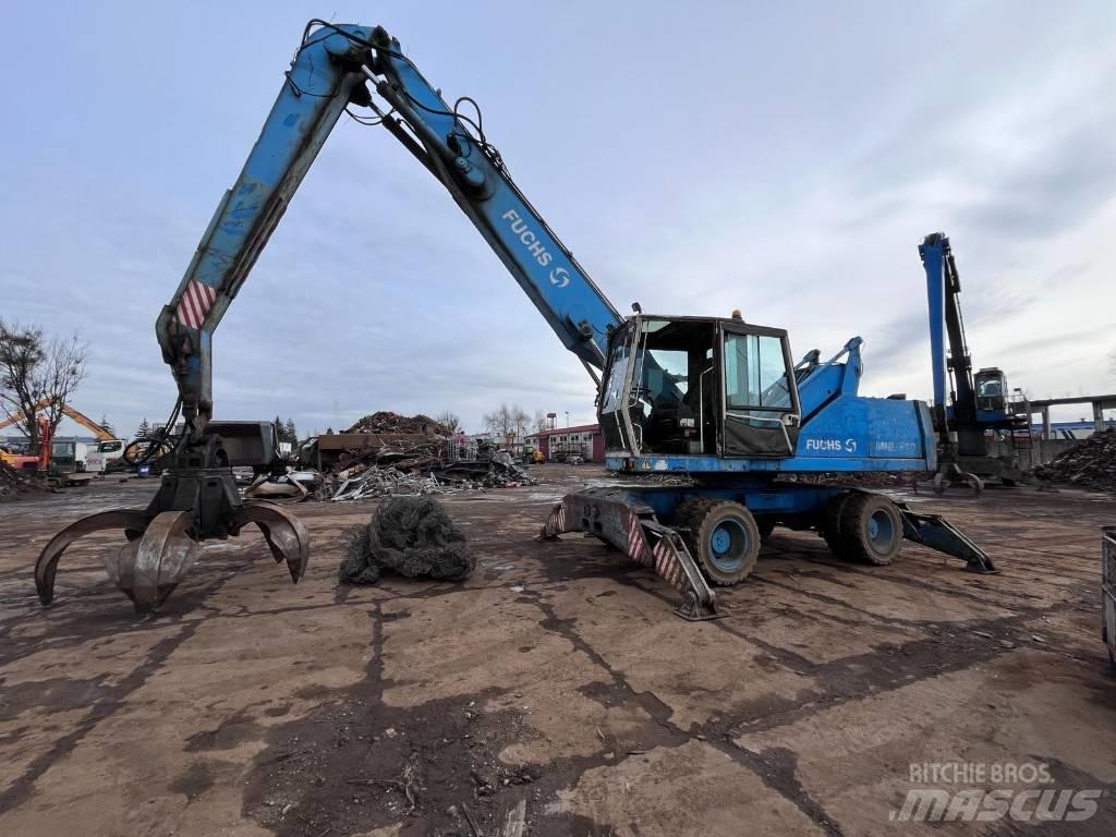 Fuchs MHL 340 Gravemaskiner for avfallshåndtering