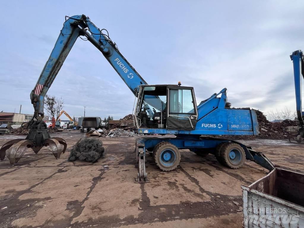 Fuchs MHL 340 Gravemaskiner for avfallshåndtering