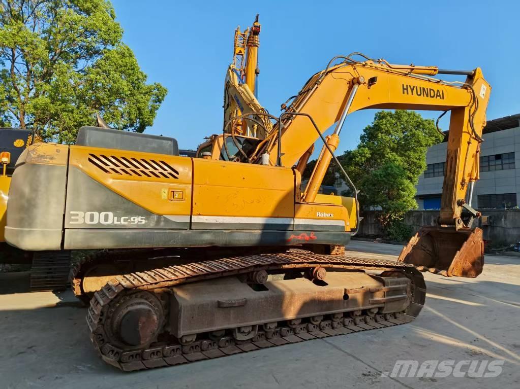 Hyundai R300LC-9S Beltegraver
