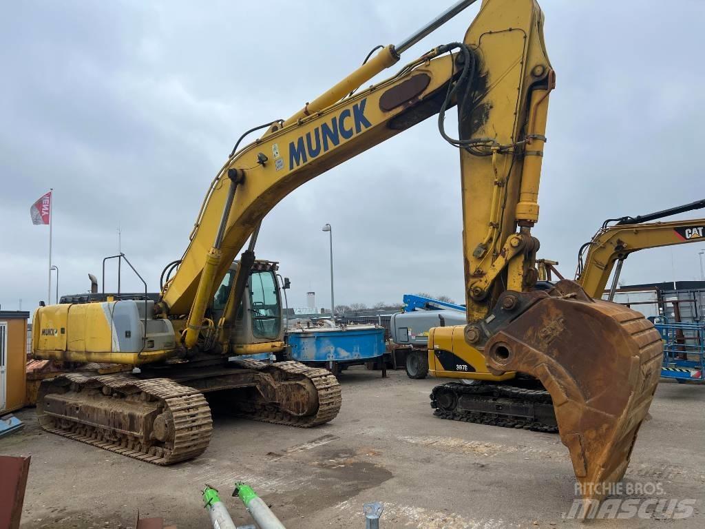 New Holland E 485 Beltegraver