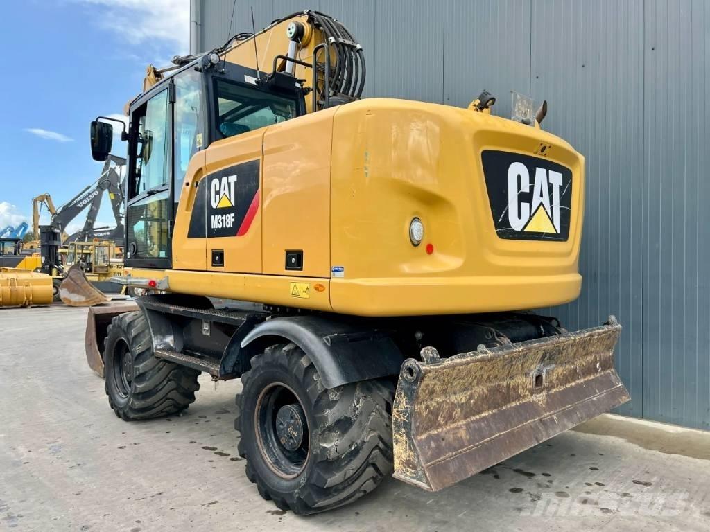 CAT M318F Hjulgravere