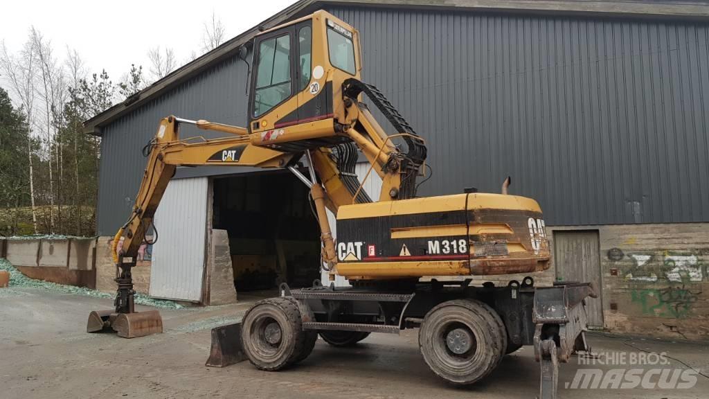 CAT M 318 Gravemaskiner for avfallshåndtering