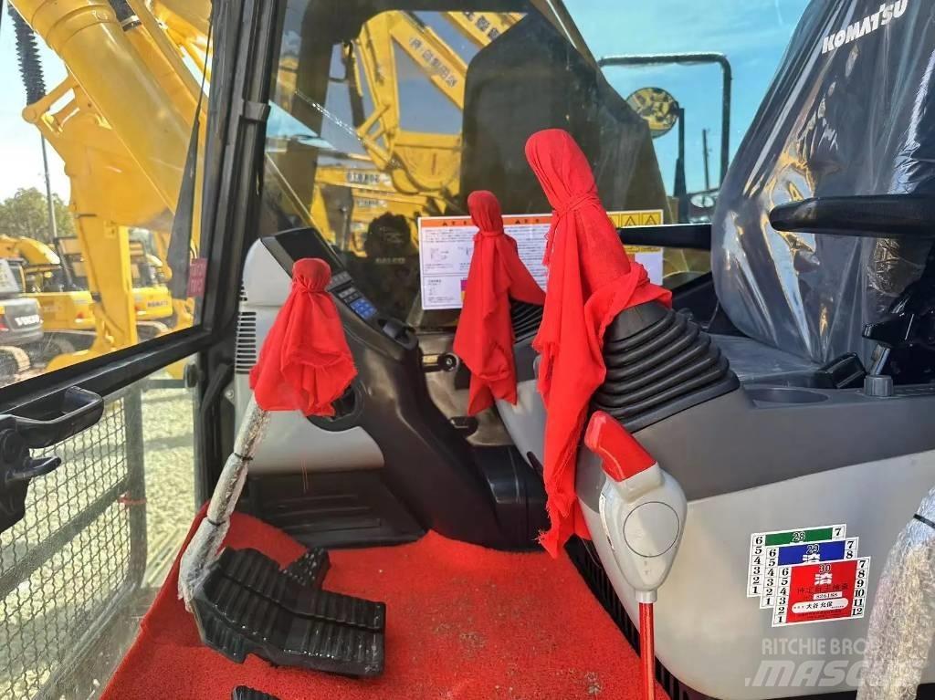 Komatsu PC 210-8 Beltegraver
