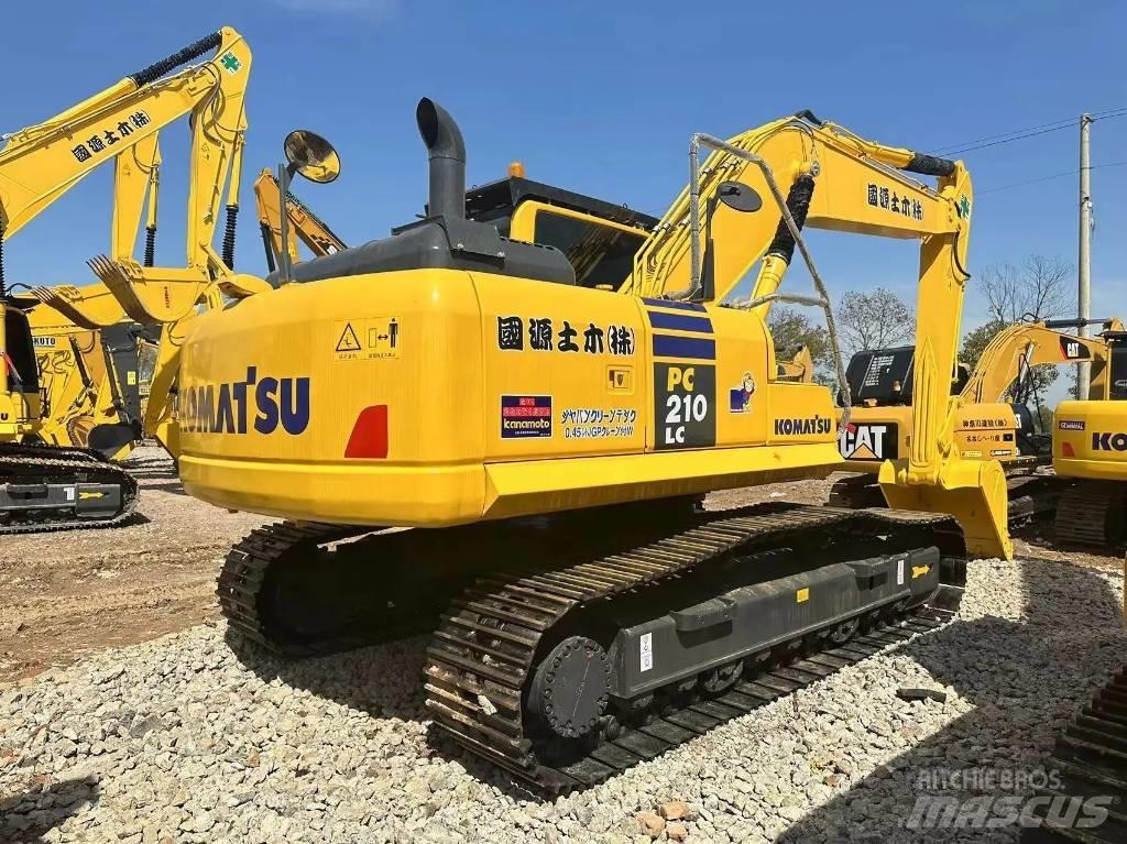 Komatsu PC 210-8 Beltegraver
