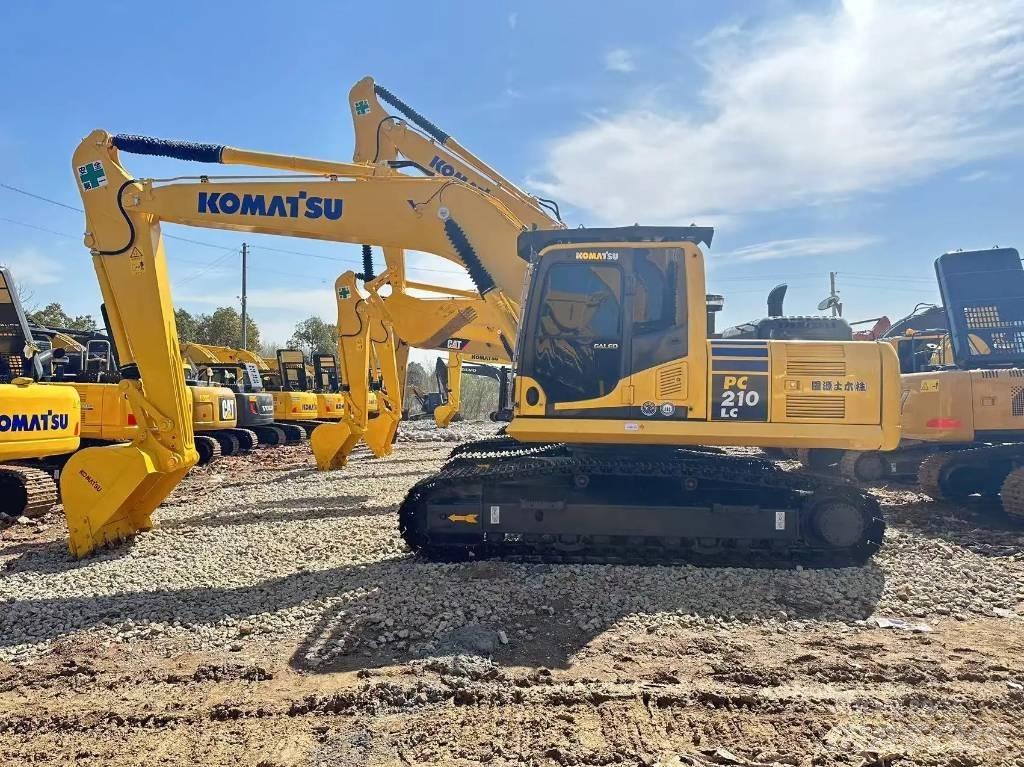 Komatsu PC 210-8 Beltegraver