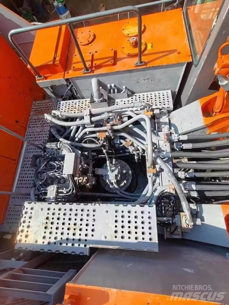 Hitachi EX 1200 Beltegraver