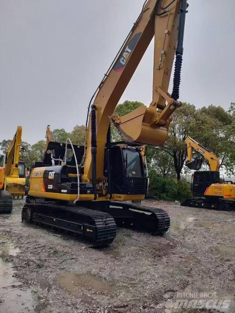 CAT 323D2 Beltegraver
