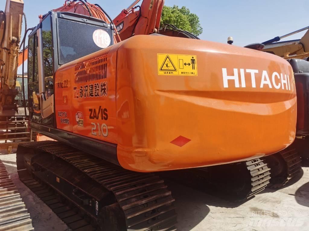 Hitachi ZX 210 Beltegraver