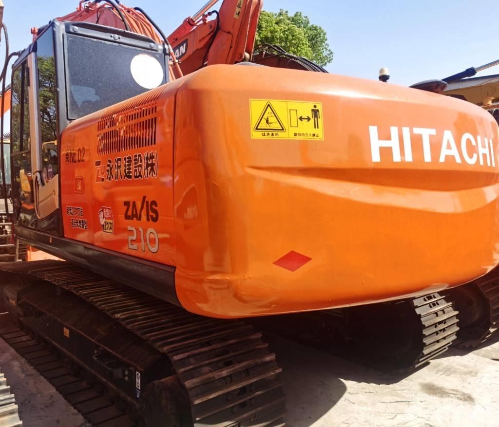 Hitachi ZX 210 Beltegraver