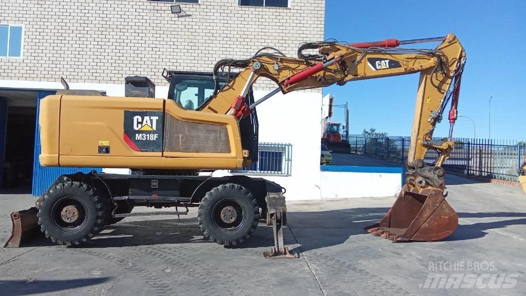 CAT M318F Hjulgravere