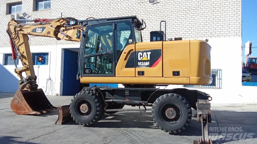 CAT M318F Hjulgravere