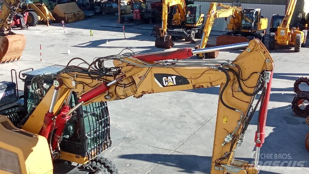CAT M318F Hjulgravere