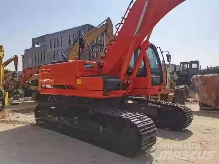 Doosan DX225LC Beltegraver