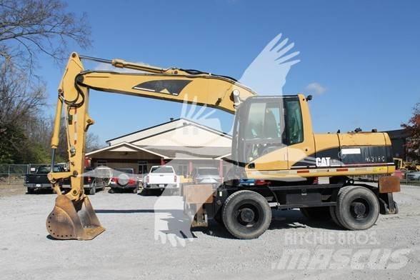 CAT M318C Hjulgravere