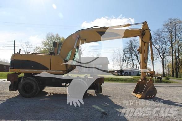 CAT M318C Hjulgravere