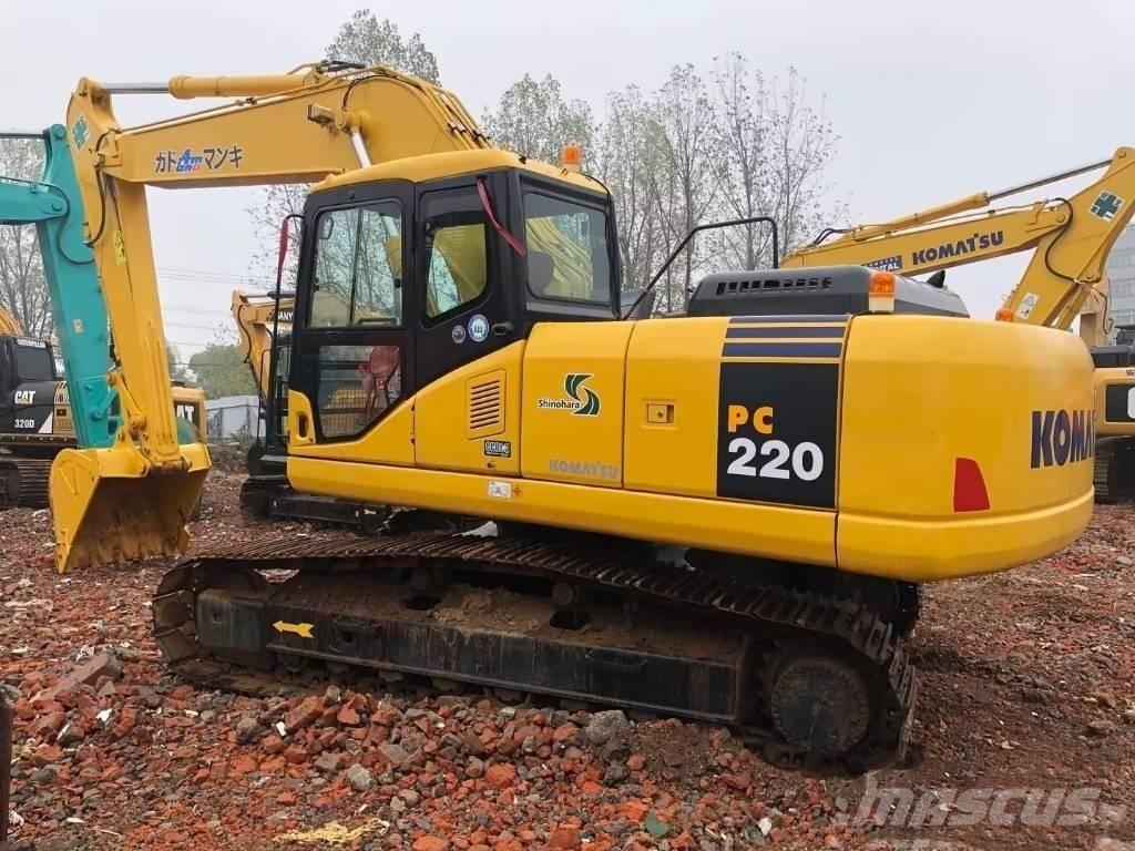 Komatsu pc220-7 Beltegraver
