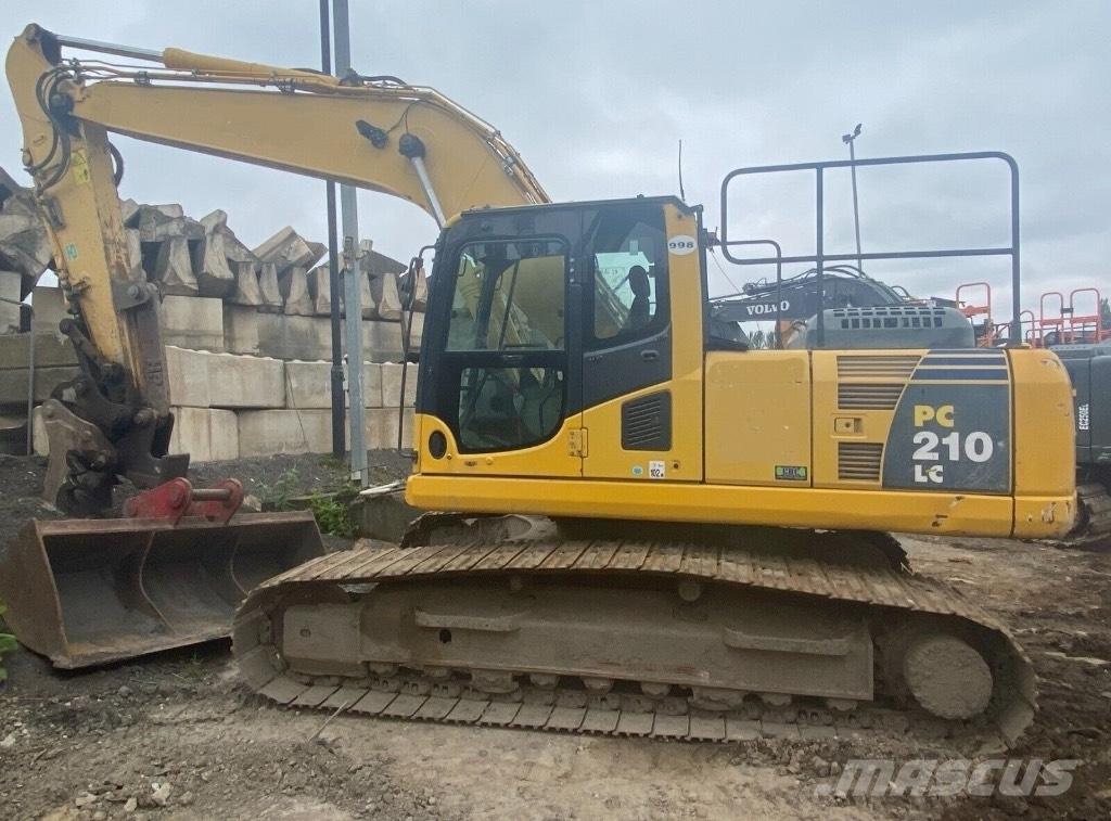 Komatsu PC 210 LC Beltegraver