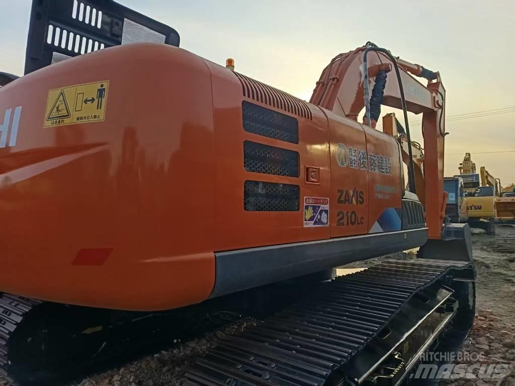 Hitachi ZX210LC Beltegraver