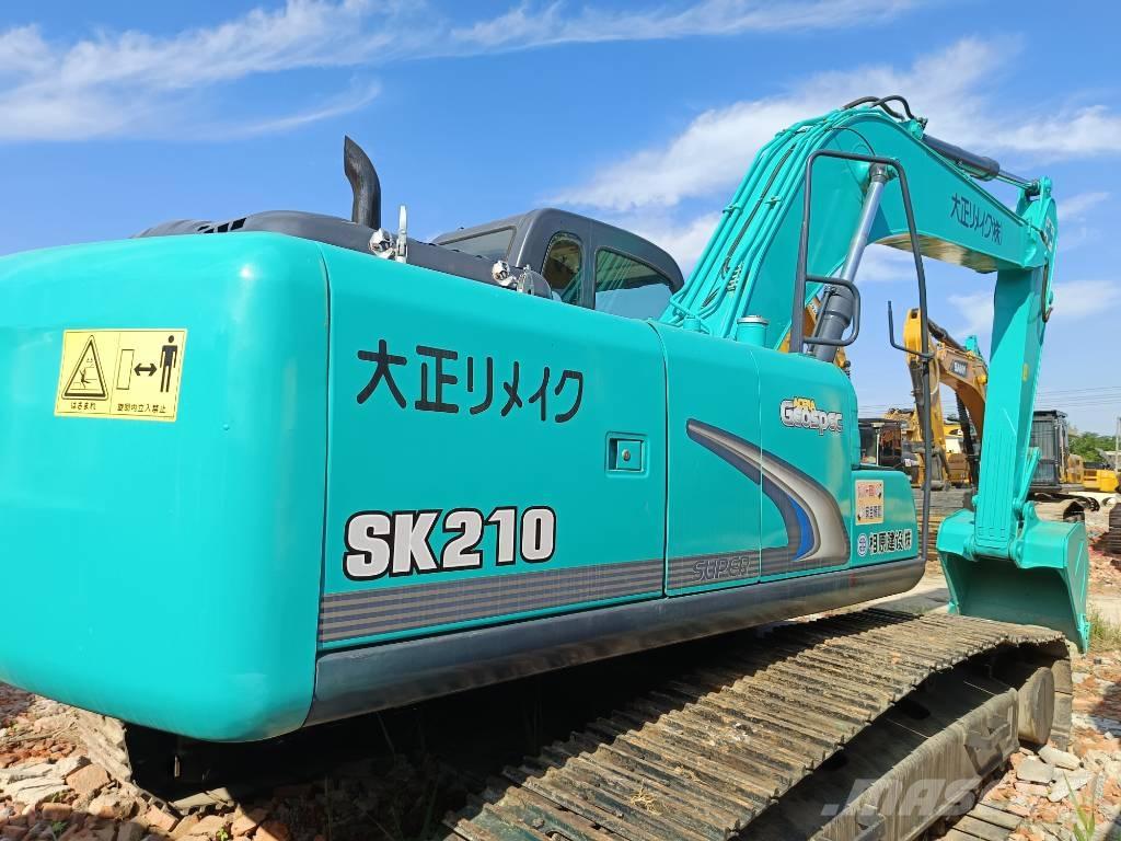 Kobelco SK 210 Beltegraver