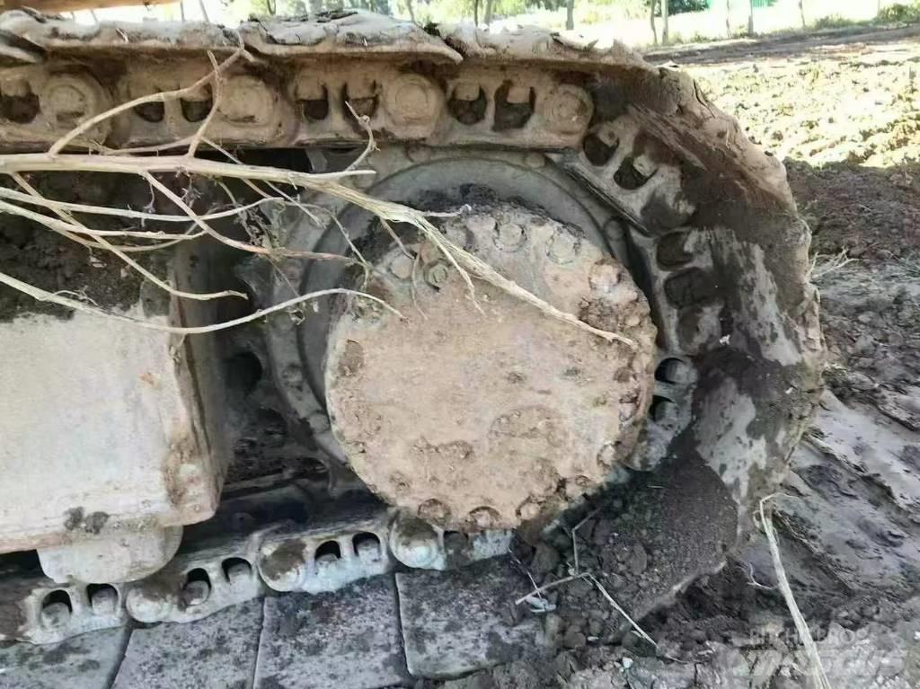 Komatsu PC 210 Beltegraver