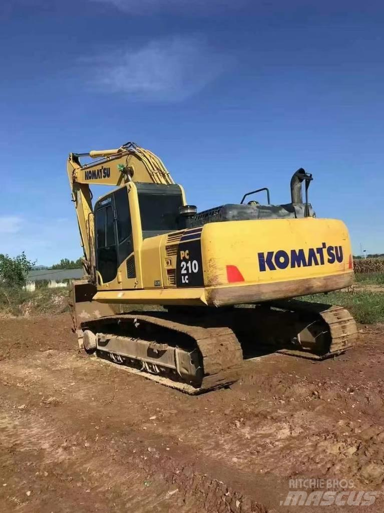 Komatsu PC 210 Beltegraver