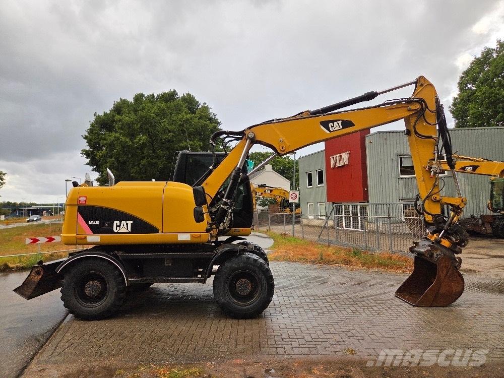 CAT M313D Hjulgravere