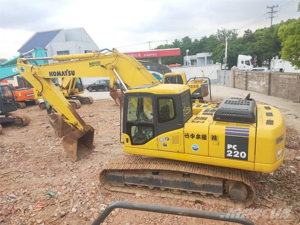 Komatsu PC220-7 Beltegraver