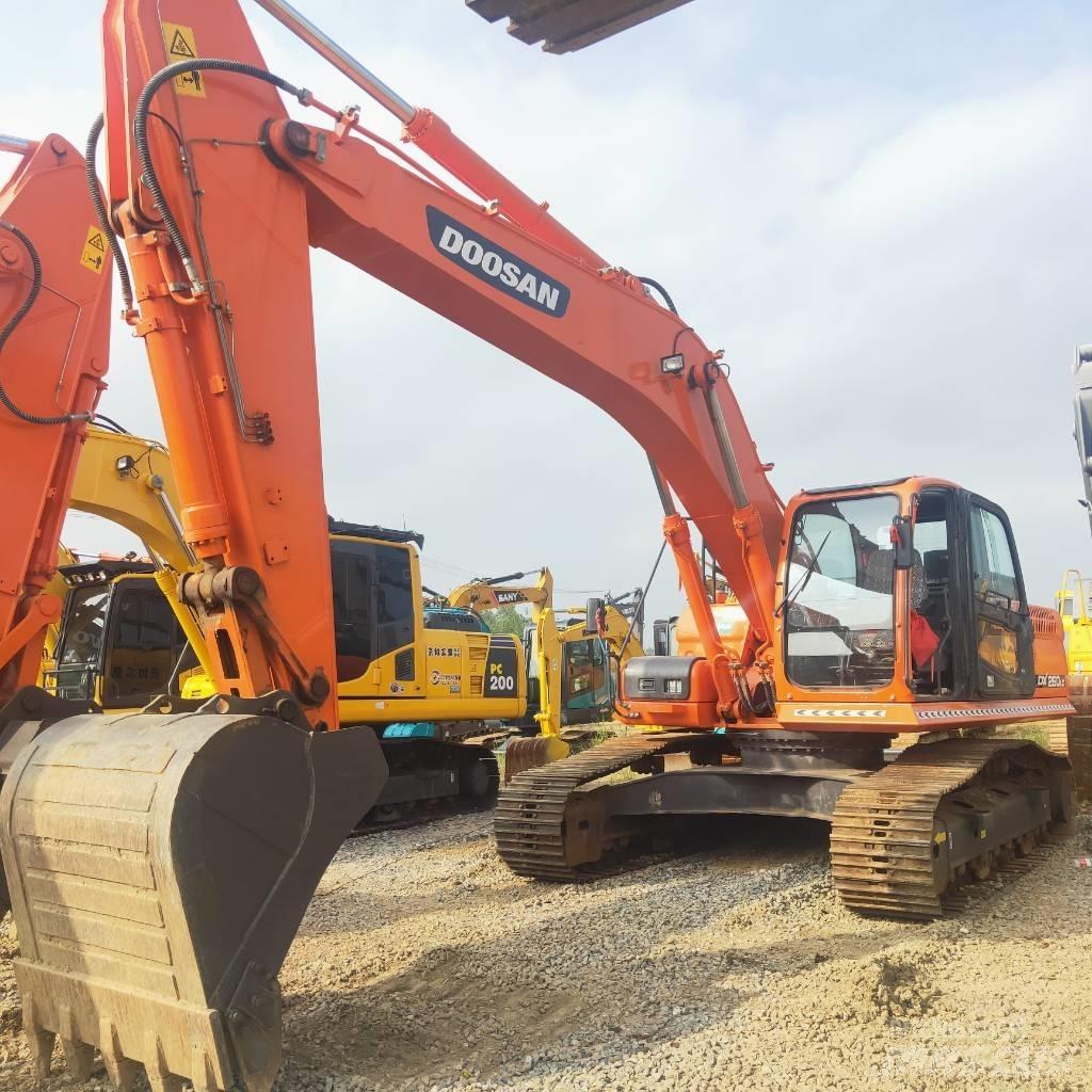 Doosan DX260LC Beltegraver