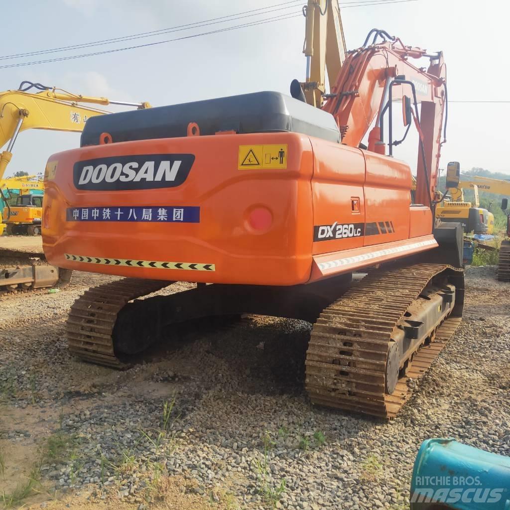 Doosan DX260LC Beltegraver