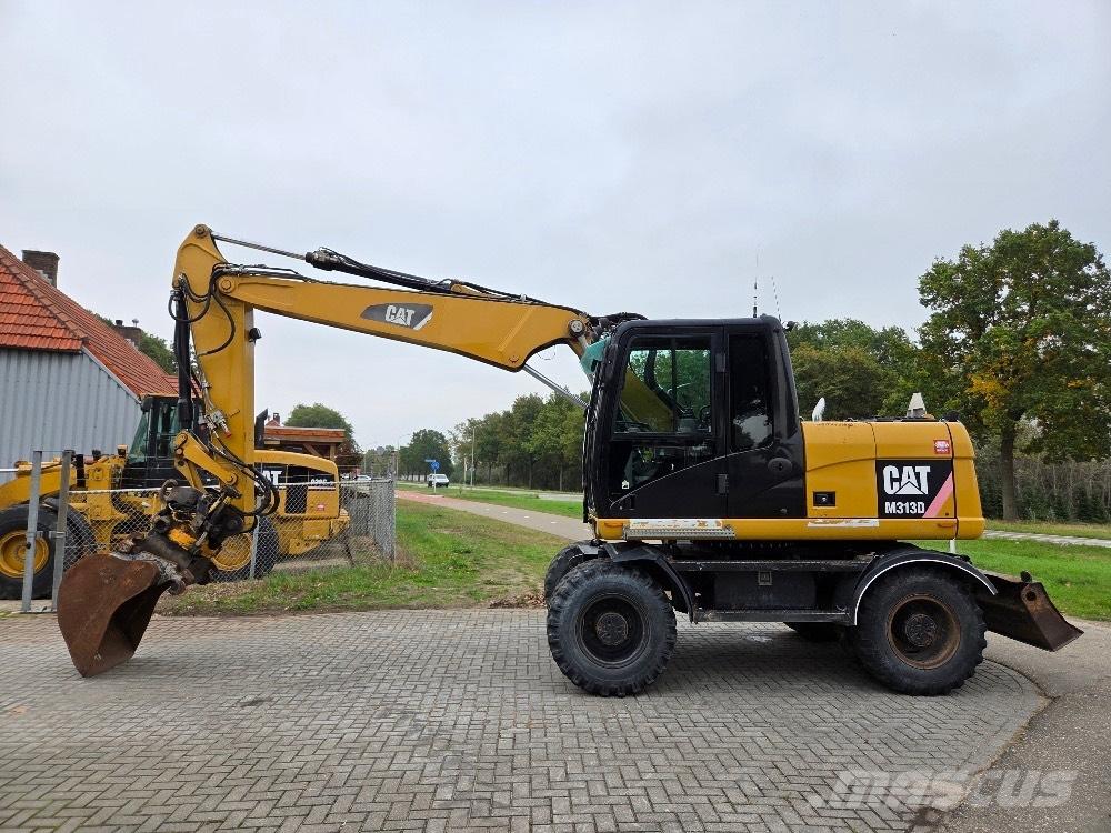 CAT M313D Hjulgravere