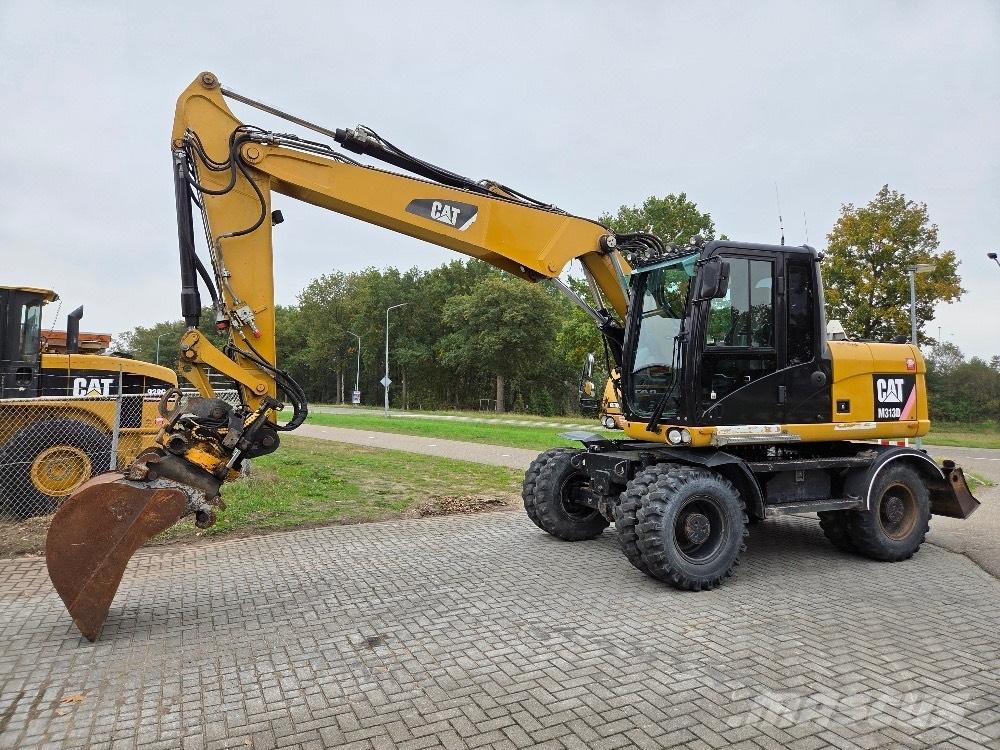 CAT M313D Hjulgravere