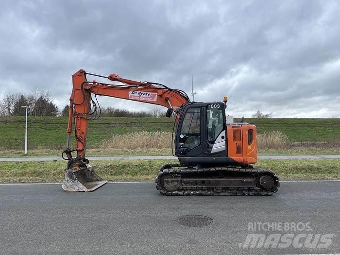 Hitachi ZX135US-5B Beltegraver